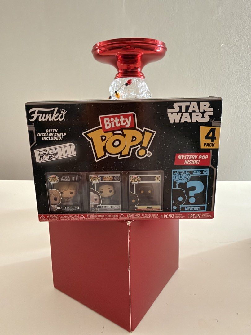 Funko Bitty Pop Star Wars 4-Pack (Category: Designer & Blind Box Toys) located in Las Pinas. Submitted by trueflower_125fe9 (Listing ID 1470490687, Image 1). Description: - Brand: Funko Star Wars Bitty Pop 4-pack - Included Figures: Luke Skywalker, Obi-Wan Kenobi, Jawa, and 1 mystery figure - Bonus: Comes with a stackable display shelf - Condition: Brand new, unopened box in great shape - Ideal for gifts and collection displays.