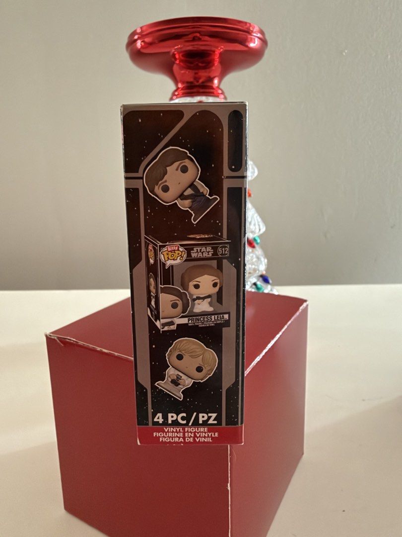 Funko Bitty Pop Star Wars 4-Pack (Category: Designer & Blind Box Toys) located in Las Pinas. Submitted by trueflower_125fe9 (Listing ID 1470490687, Image 3). Description: - Brand: Funko Star Wars Bitty Pop 4-pack - Included Figures: Luke Skywalker, Obi-Wan Kenobi, Jawa, and 1 mystery figure - Bonus: Comes with a stackable display shelf - Condition: Brand new, unopened box in great shape - Ideal for gifts and collection displays.