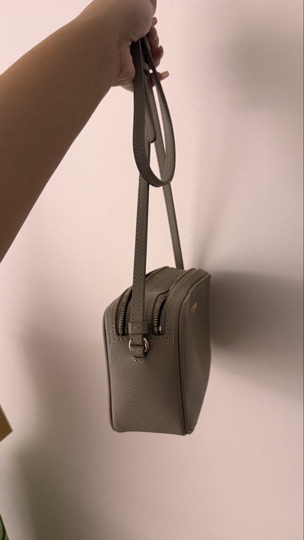 Furla Gray Leather Crossbody Bag (Category: Cross-body Bags) located in Makati City. Submitted by andrae.thomas (Listing ID 1470439067, Image 2). Description: - Brand: Furla - Style: Structured crossbody / camera bag - Strap not removable - Original with dustbag - Issue: with dried glue on the inside MAKATI AREA Meet Up: TAFT, Dlsu, CSB, Cash and Carry Fixed price.