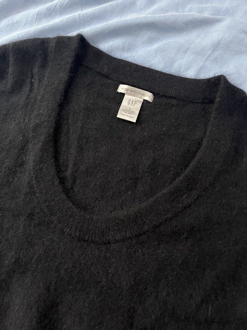 Gap Black Angora Wool Scoop Neck Sweater Size S (Category: Longsleeves) located in Las Pinas. Submitted by snr___salad (Listing ID 1470402226, Image 3). Description: - Brand: Gap - Color: Classic Black - Material: Luxurious angora, nylon, and wool blend - Texture: Soft and fuzzy - Design: Scoop neckline, long sleeves, ribbed hem and cuffs - Size: Small (Cute rin worn backwards!! Boat neck low back moment).