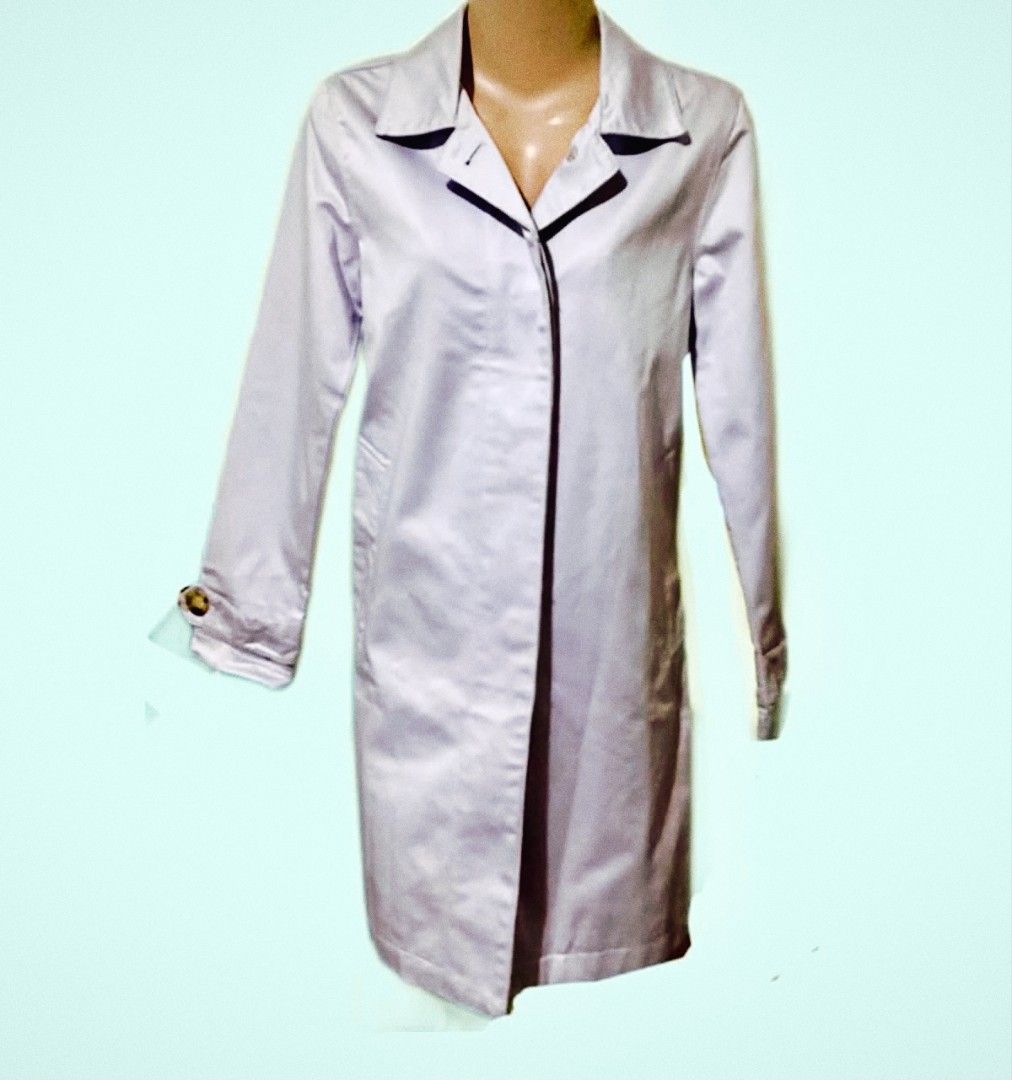 Gap Light Purple Trench Coat Single Breasted Button Jacket (Category: Coats, Jackets and Outerwear) located in Paranaque City. Submitted by calm_youngstore7 (Listing ID 1470472964, Image 2). Description: - Brand: Gap - Color: Light purple - Style: Single-breasted trench coat with structured collar and front pockets - Measurements: Length 32" | Chest 18" | Shoulders 15.5" | Sleeves 22" - Condition: Excellent, ready to wear - Perfect for smart-casu