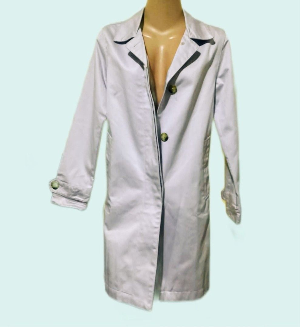 Gap Light Purple Trench Coat Single Breasted Button Jacket (Category: Coats, Jackets and Outerwear) located in Paranaque City. Submitted by calm_youngstore7 (Listing ID 1470472964, Image 3). Description: - Brand: Gap - Color: Light purple - Style: Single-breasted trench coat with structured collar and front pockets - Measurements: Length 32" | Chest 18" | Shoulders 15.5" | Sleeves 22" - Condition: Excellent, ready to wear - Perfect for smart-casu