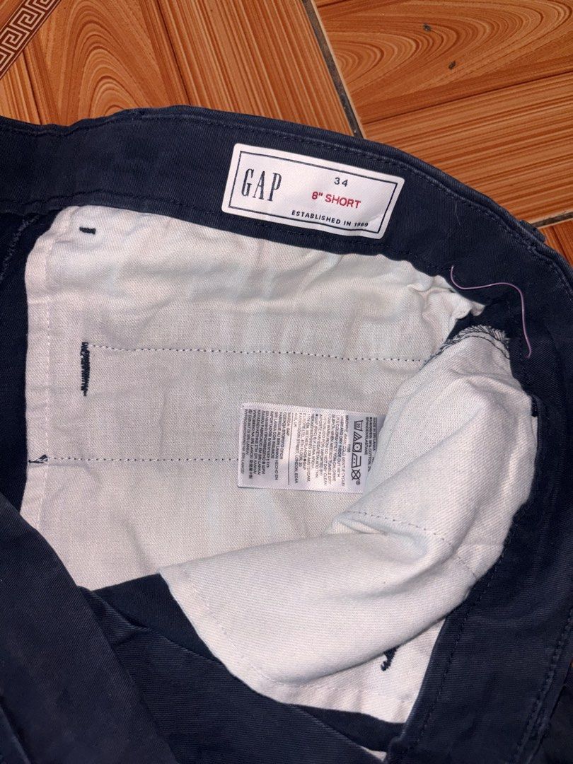 Gap Navy Blue 8-Inch Short Size 34 (Category: Shorts) located in Polomolok. Submitted by rrthrift (Listing ID 1470503490, Image 3). Description: - Brand: Gap - Color: Navy Blue - Size: 34 - Inseam: 8 inches - Style: Classic chino with front and back pockets - Closure: Button and zip fly - Material: Comfortable cotton blend for daily wear - Condition: Clean and well-maintained.