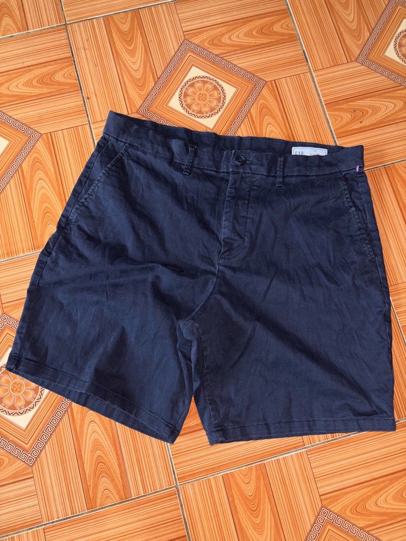 Gap Navy Blue 8-Inch Short Size 34 (Category: Shorts) located in Polomolok. Submitted by rrthrift (Listing ID 1470503490, Image 1). Description: - Brand: Gap - Color: Navy Blue - Size: 34 - Inseam: 8 inches - Style: Classic chino with front and back pockets - Closure: Button and zip fly - Material: Comfortable cotton blend for daily wear - Condition: Clean and well-maintained.