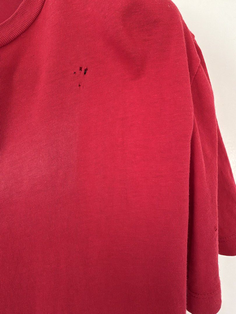Gap The Essential Crew Red T-Shirt Size M (Category: Shirts) located in Quezon City. Submitted by satisfied_buyer (Listing ID 1470554727, Image 3). Description: - Brand/Item: Gap The Essential Crew T-Shirt - Color: Bright Red - Size: Medium (Regular Fit) - Material: 100% Cotton - Origin: Made in Vietnam - Style Code: 767861 - Condition Note: Has small holes near the collar on the front left chest Decluttering Shoulders 47m Chest 48m Length 70m.