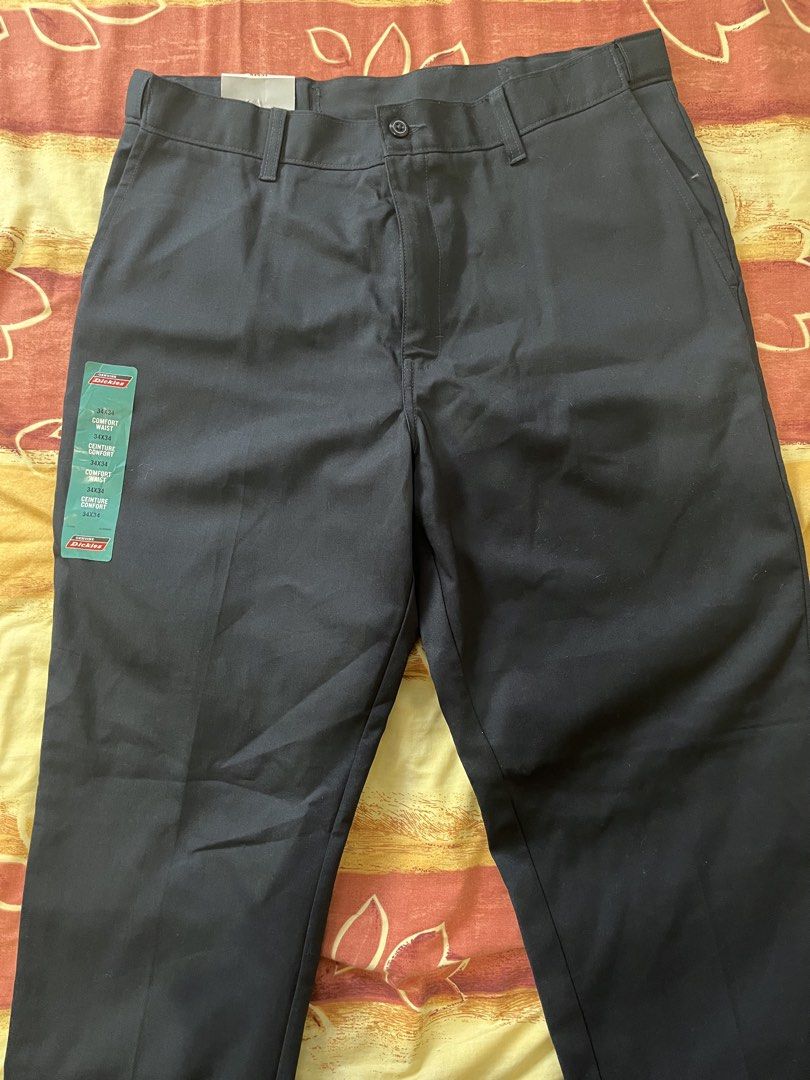 Genuine Dickies Comfort Waist Flex Pants (Category: Trousers) located in Tayabas. Submitted by ste1n (Listing ID 1470403233, Image 2). Description: - Brand: Genuine Dickies - Style: Flat front comfort waist flex pants - Color: Navy blue - Size: 34W x 34L - Fit: Regular fit (sits slightly below waist) - Features: Flex fabric for easy movement, stain release, and moisture wicking - Condition: Brand new with tags attached.