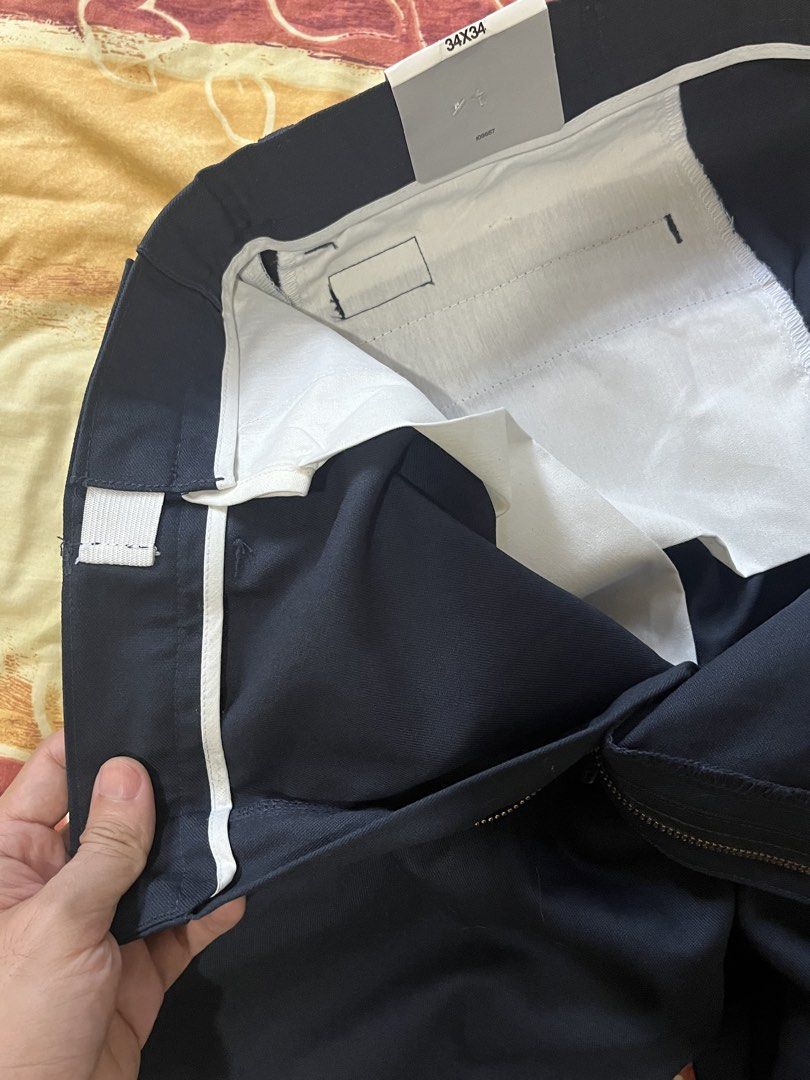 Genuine Dickies Comfort Waist Flex Pants (Category: Trousers) located in Tayabas. Submitted by ste1n (Listing ID 1470403233, Image 3). Description: - Brand: Genuine Dickies - Style: Flat front comfort waist flex pants - Color: Navy blue - Size: 34W x 34L - Fit: Regular fit (sits slightly below waist) - Features: Flex fabric for easy movement, stain release, and moisture wicking - Condition: Brand new with tags attached.