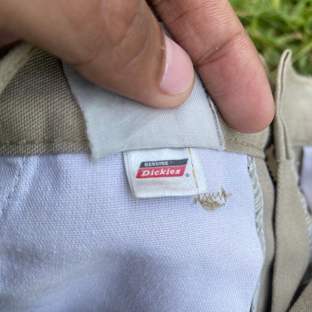 Genuine Dickies Khaki Shorts (Category: Shorts) located in Butuan. Submitted by gardenofjayden (Listing ID 1470445889, Image 3). Description: - Brand: Genuine Dickies - Color: Classic tan / khaki - Material: Sturdy cotton twill - Features: Front pockets, back welt pockets, button closure, and logo patch on left hem - Condition: Clean overall finish - Style: Casual warm-weather staple - Needs Wash.
