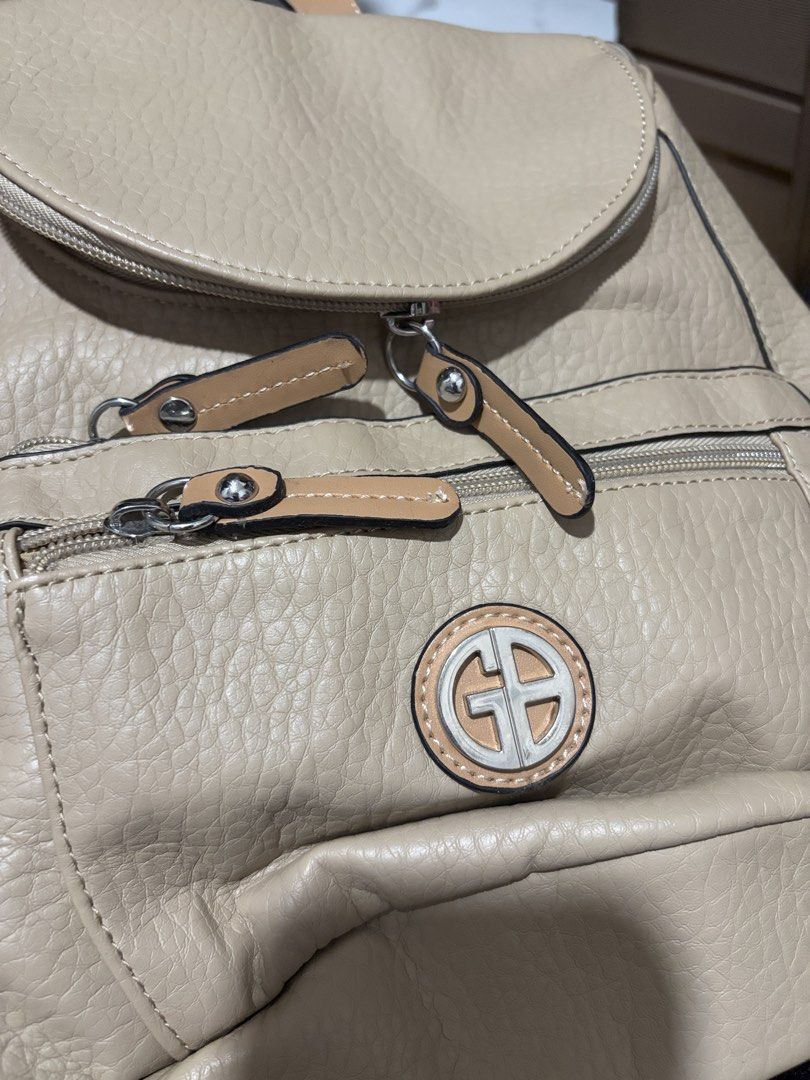 GIANI BERNINI (Category: Backpacks) located in Pili. Submitted by readysetthrift (Listing ID 1470351551, Image 1). Description: .