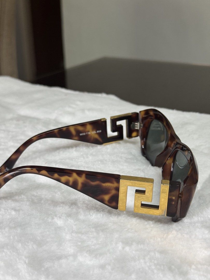 Gianni Versace (Category: Sunglasses & Eyewear) located in Bocaue. Submitted by mamikyuti (Listing ID 1470399514, Image 2). Description: GIANNI VERSACE Mod. T75 Col. 869 square gold Greek sunglasses Italy 90s RATE FIND.