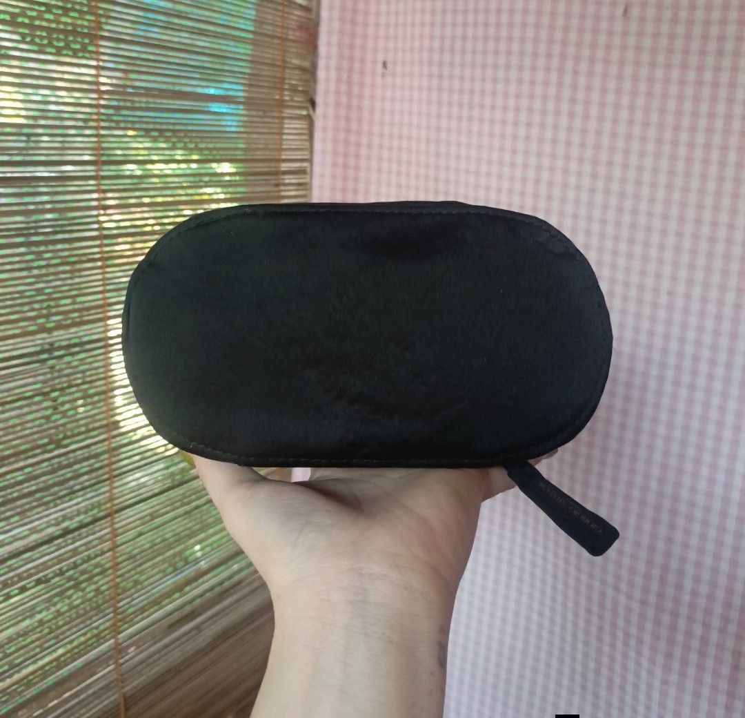 Giorgio Armani Beauty Black Makeup Pouch (Category: Purses & Pouches) located in Digos. Submitted by jenepiisid83759 (Listing ID 1470368442, Image 2). Description: - Brand: Giorgio Armani Beauty - Material: Luxurious black velvet with chevron stitching and gold GA logo - Closure: Gold zipper with branded fabric pull tab - Interior: Fully lined with official brand tag - Condition: Brand new, clean - Use: Ideal for everyday makeup essentials or tra