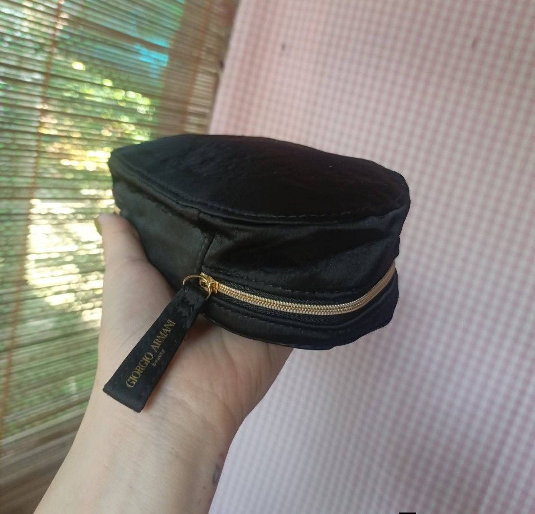 Giorgio Armani Beauty Black Makeup Pouch (Category: Purses & Pouches) located in Digos. Submitted by jenepiisid83759 (Listing ID 1470368442, Image 3). Description: - Brand: Giorgio Armani Beauty - Material: Luxurious black velvet with chevron stitching and gold GA logo - Closure: Gold zipper with branded fabric pull tab - Interior: Fully lined with official brand tag - Condition: Brand new, clean - Use: Ideal for everyday makeup essentials or tra
