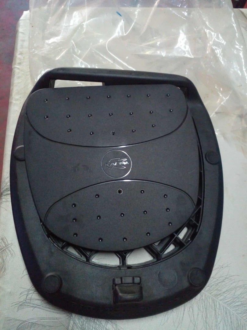 Givi Monolock Motorcycle Top Box Mounting Plate Base (Category: Body Parts and Accessories) located in Manila. Submitted by wisegem-231b (Listing ID 1470404167, Image 1). Description: - Compatible with Givi Monolock top box systems - Sturdy black plastic construction built to last - Secure grid design on the underside for firm attachment to your motorcycle rack - Features the central logo emblem for an authentic look - Ready to install on your mo