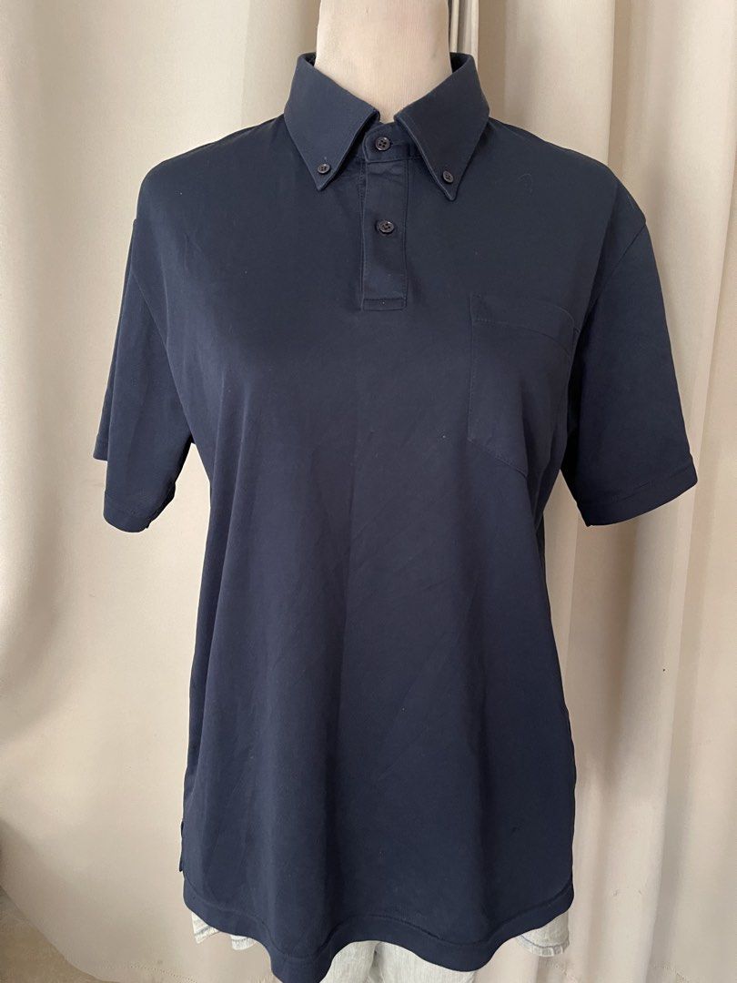 Glimmer Navy Blue Polo drifit (Category: Tshirts & Polo Shirts ) located in Cainta. Submitted by zlove111 (Listing ID 1470454866, Image 1). Description: - Brand: Glimmer - Color: Navy Blue - Size: L 20" - Details: Button-down collar, front chest pocket - Condition: Clean piece, fabric is in great shape.