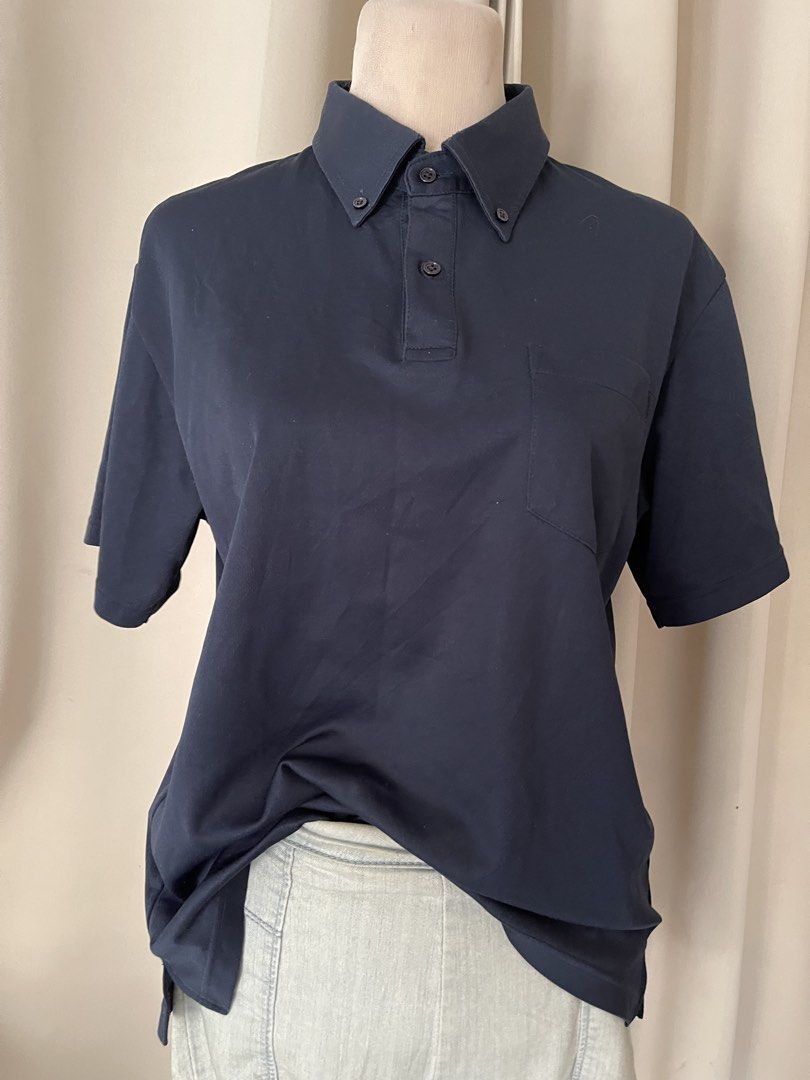 Glimmer Navy Blue Polo drifit (Category: Tshirts & Polo Shirts ) located in Cainta. Submitted by zlove111 (Listing ID 1470454866, Image 2). Description: - Brand: Glimmer - Color: Navy Blue - Size: L 20" - Details: Button-down collar, front chest pocket - Condition: Clean piece, fabric is in great shape.