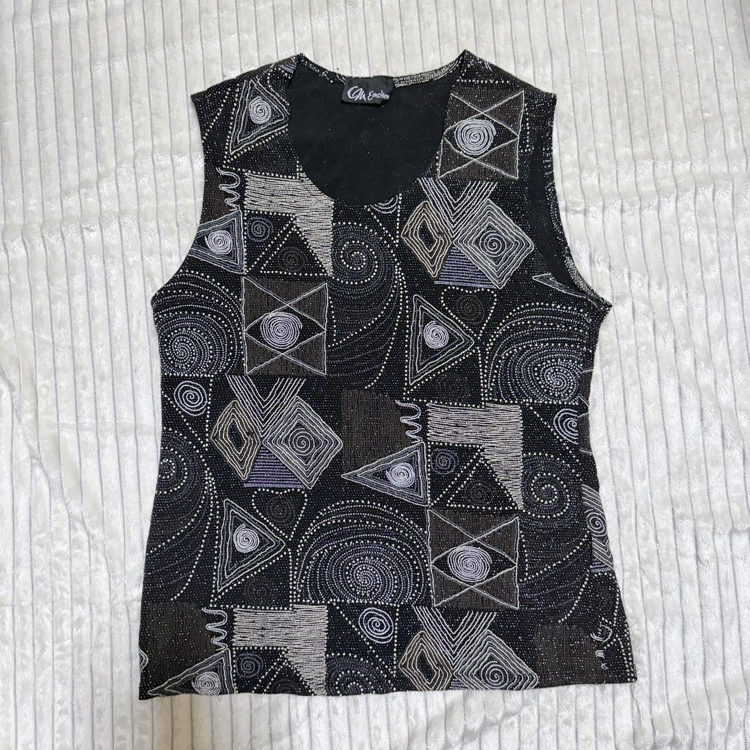 Black Geometric Beadwork-like Sleeveless Tank Top (Category: Sleeveless) located in Manila. Submitted by ish.vintage (Listing ID 1470482463, Image 1). Description: - Color: Black with silver, grey, and bronze beadwork - Stretchy, can fit M-L - Design: Textured geometric beadwork-like swirl patterns with a scoop neckline - Style: Sleeveless tank top, perfect statement piece for parties and evening wear - Detail: Handcrafted look.