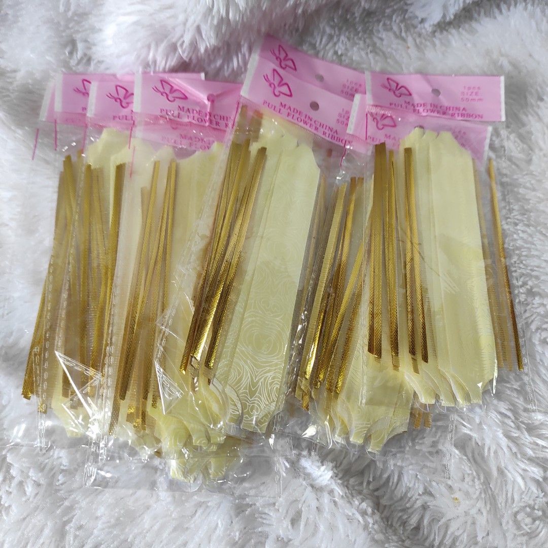 Gold Pull Flower Ribbons 10 pcs (Category: Occasions & Party Supplies) located in Cainta. Submitted by fukunekojapansurplus (Listing ID 1470365699, Image 2). Description: 100 pesos Take all 10 Pull Flower Ribbons Brand New *1st pic for ref only.