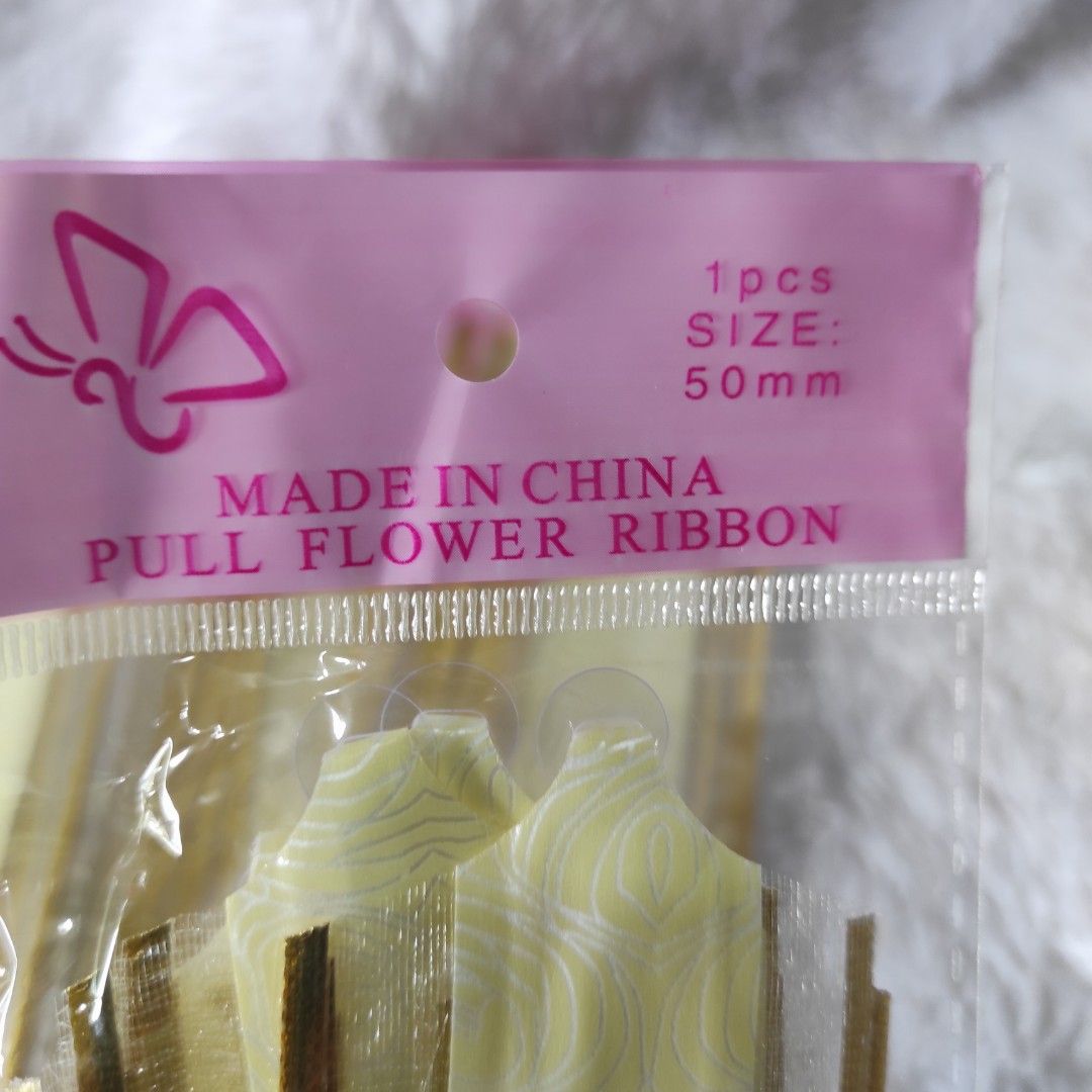 Gold Pull Flower Ribbons 10 pcs (Category: Occasions & Party Supplies) located in Cainta. Submitted by fukunekojapansurplus (Listing ID 1470365699, Image 3). Description: 100 pesos Take all 10 Pull Flower Ribbons Brand New *1st pic for ref only.