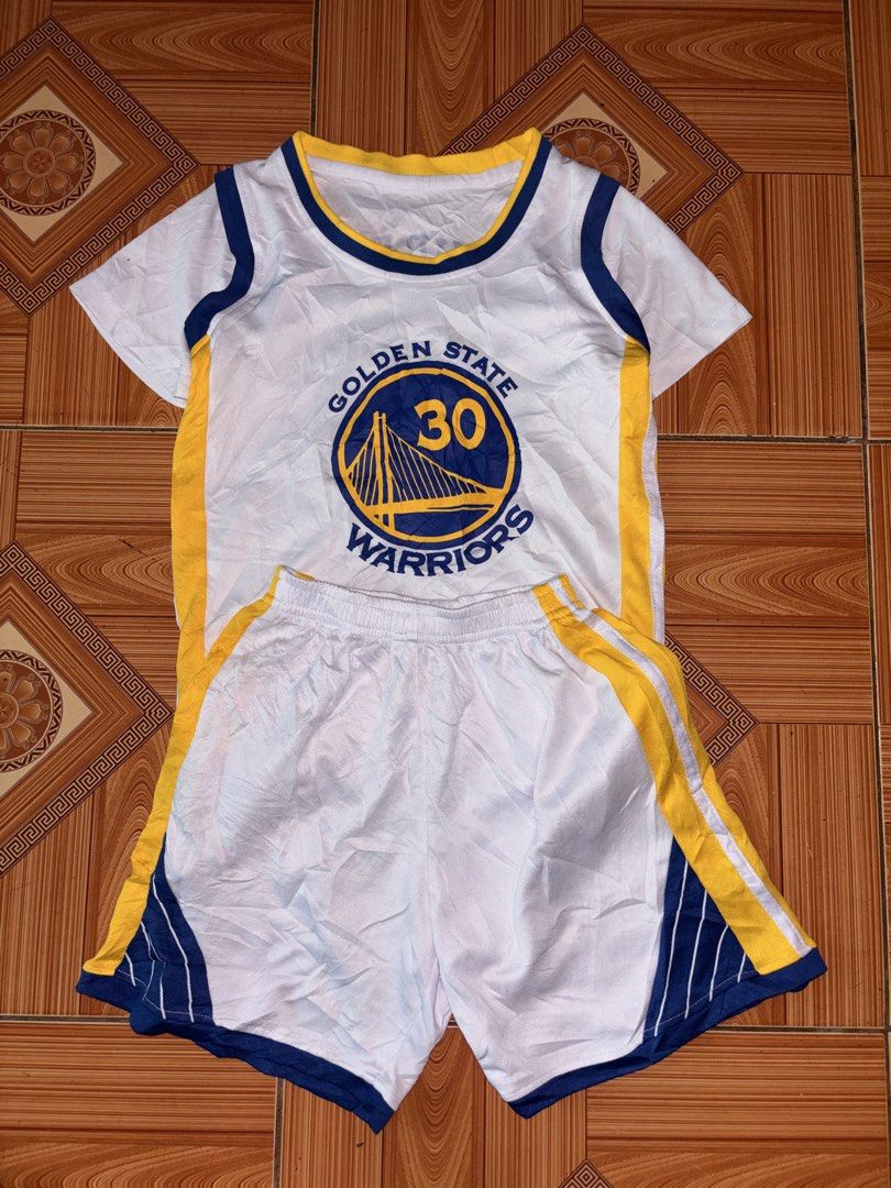 Golden State Warriors Curry 30 Jersey Set (Category: Babies & Kids Fashion) located in Polomolok. Submitted by rrthrift (Listing ID 1470501803, Image 1). Description: - Brand new Golden State Warriors jersey and shorts set - Features Stephen Curry #30 printed on chest and back - Stylish blue and yellow trim along sleeves and sides - Shorts come with a comfortable elastic waistband and matching side stripes - Lightweight fabric ideal for playing b
