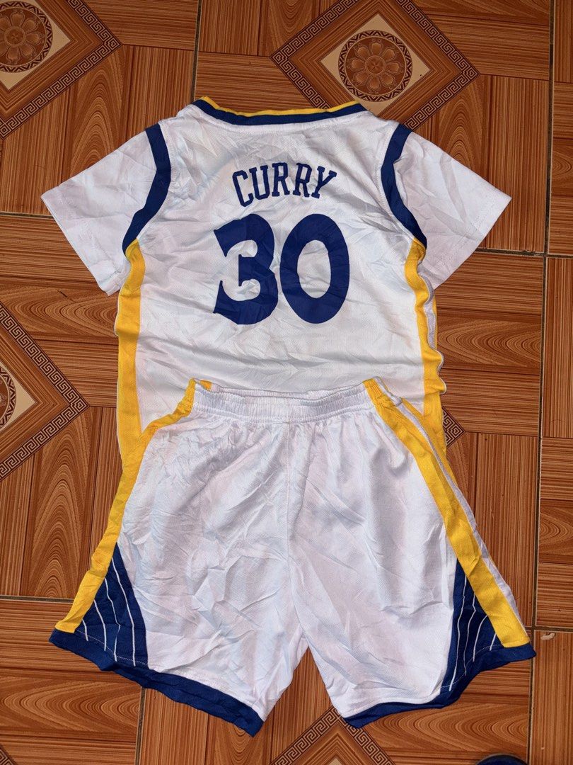 Golden State Warriors Curry 30 Jersey Set (Category: Babies & Kids Fashion) located in Polomolok. Submitted by rrthrift (Listing ID 1470501803, Image 2). Description: - Brand new Golden State Warriors jersey and shorts set - Features Stephen Curry #30 printed on chest and back - Stylish blue and yellow trim along sleeves and sides - Shorts come with a comfortable elastic waistband and matching side stripes - Lightweight fabric ideal for playing b