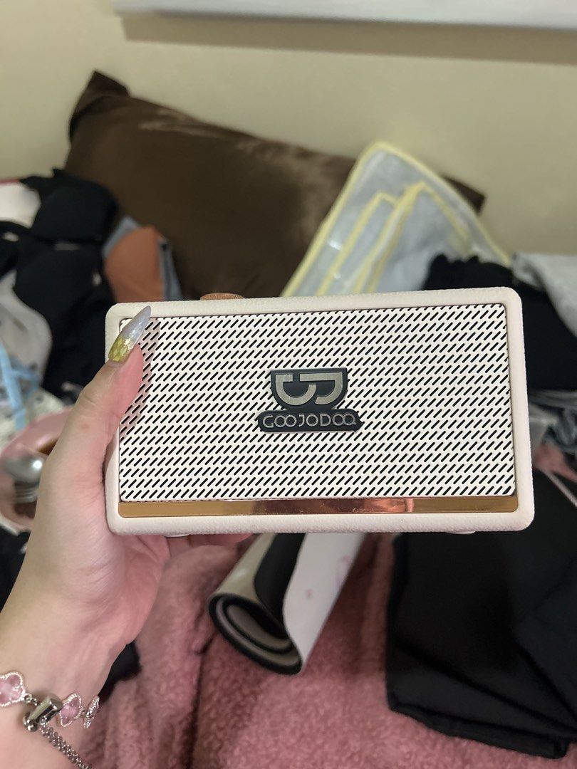 GOOJODOQ wireless portable bluetooth speaker cream rose gold (Category: Soundbars, Speakers & Amplifiers) located in Mataasnakahoy. Submitted by monoky (Listing ID 1470375321, Image 1). Description: GOOJODOQ Retro Bluetooth Speaker – Pink/Rose Gold 🎀 Price: ₱400 only * Cute vintage-inspired design * Pink/cream color with rose gold accents * Bluetooth speaker with physical control buttons * Compact and aesthetic, perfect for desk setups WORKING C