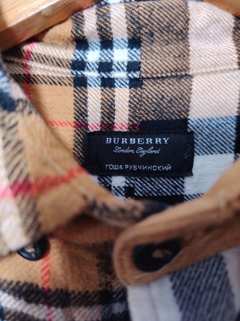 Gosha Rubchinskiy x Burberry split flannel wool type long sleeve (Category: Formal Shirts) located in Malabon City. Submitted by jhe_bicio_online-thriftshop (Listing ID 1470397577, Image 3). Description: Price is still negotiable for sure buyer Size medium on tag Dimensions 22. 5x27.5 Good condition.
