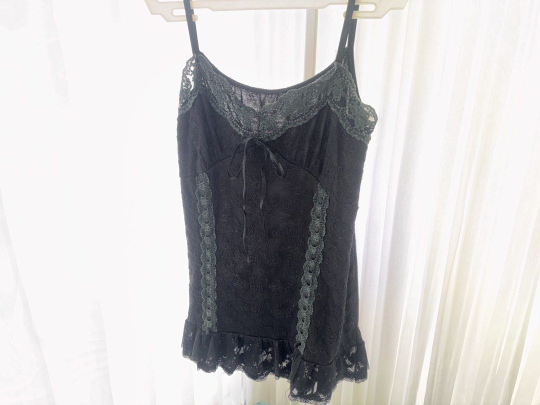gothic black lace trim babydoll top (Category: Sleeveless) located in Manila. Submitted by gothclaudia (Listing ID 1470429556, Image 2). Description: - black with dark lace trim - beautiful ribbons and ruffle hem details - textured material with subtle pattern throughout - super comfortable and versatile!.