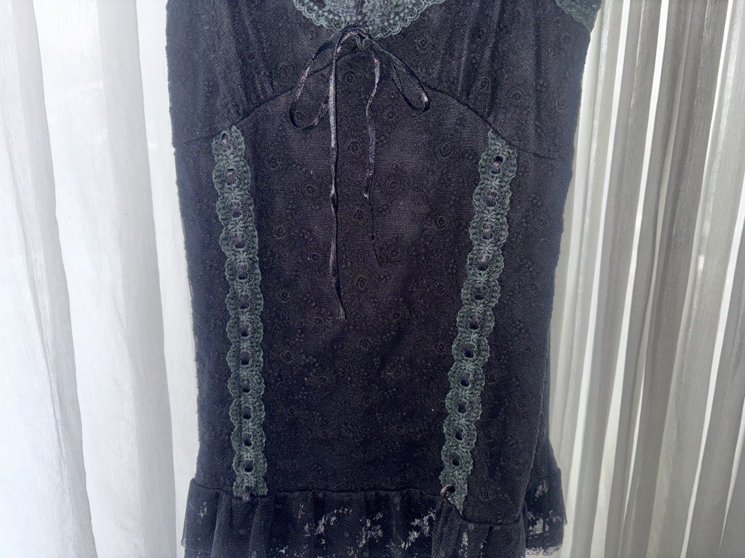 gothic black lace trim babydoll top (Category: Sleeveless) located in Manila. Submitted by gothclaudia (Listing ID 1470429556, Image 1). Description: - black with dark lace trim - beautiful ribbons and ruffle hem details - textured material with subtle pattern throughout - super comfortable and versatile!.