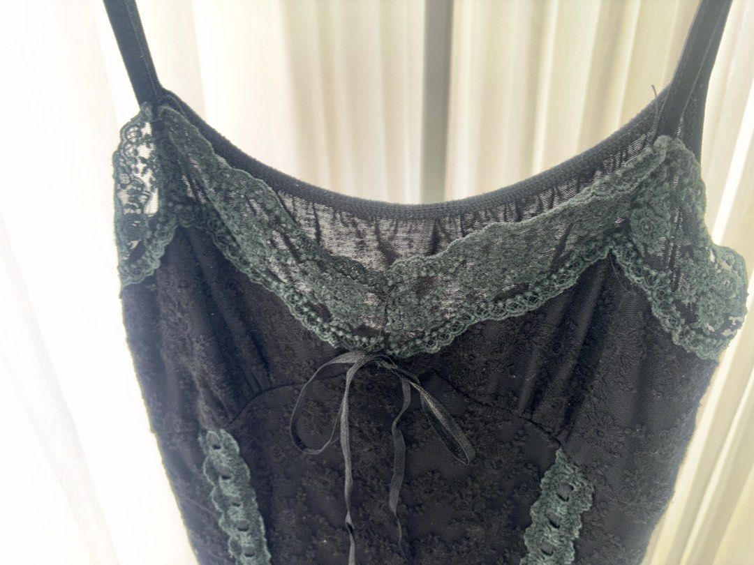 gothic black lace trim babydoll top (Category: Sleeveless) located in Manila. Submitted by gothclaudia (Listing ID 1470429556, Image 3). Description: - black with dark lace trim - beautiful ribbons and ruffle hem details - textured material with subtle pattern throughout - super comfortable and versatile!.
