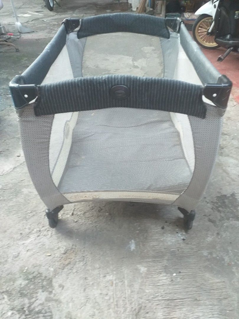 Graco baby playpen play yard grey (Category: Cots & Cribs) located in Manila. Submitted by wisegem-231b (Listing ID 1470396571, Image 2). Description: - Authentic Graco baby playpen in stylish grey and black - Breathable mesh sides for maximum ventilation and visibility - Sturdy metal frame featuring soft, padded top rails - Convenient wheels on one end for easy room-to-room mobility - Compact, foldable design ideal for storage and travel - Clean
