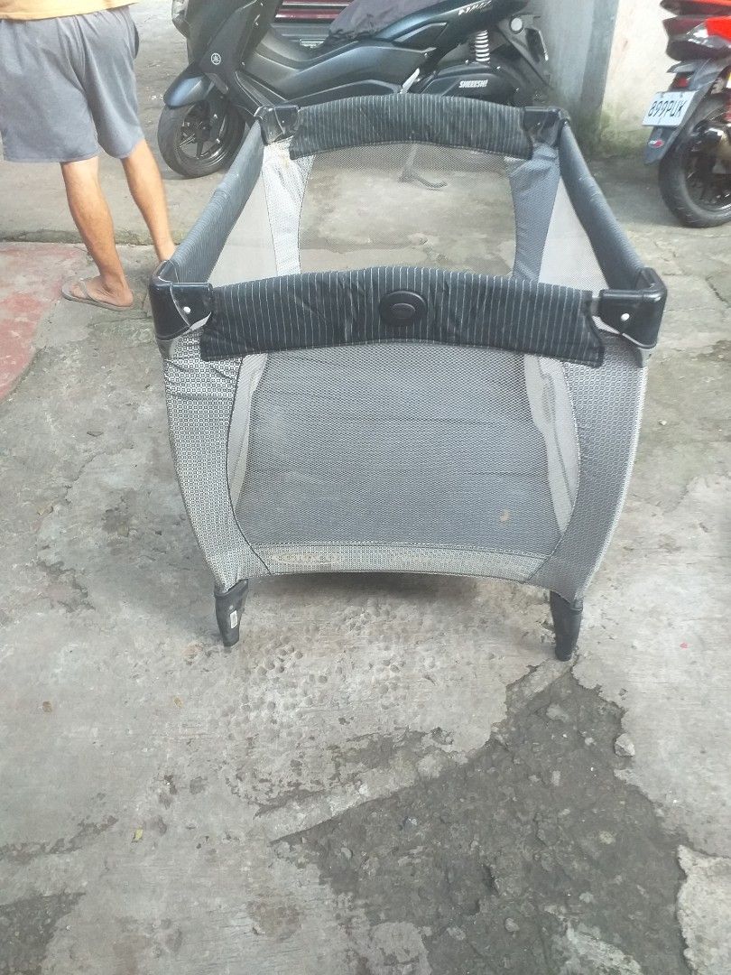 Graco baby playpen play yard grey (Category: Cots & Cribs) located in Manila. Submitted by wisegem-231b (Listing ID 1470396571, Image 1). Description: - Authentic Graco baby playpen in stylish grey and black - Breathable mesh sides for maximum ventilation and visibility - Sturdy metal frame featuring soft, padded top rails - Convenient wheels on one end for easy room-to-room mobility - Compact, foldable design ideal for storage and travel - Clean