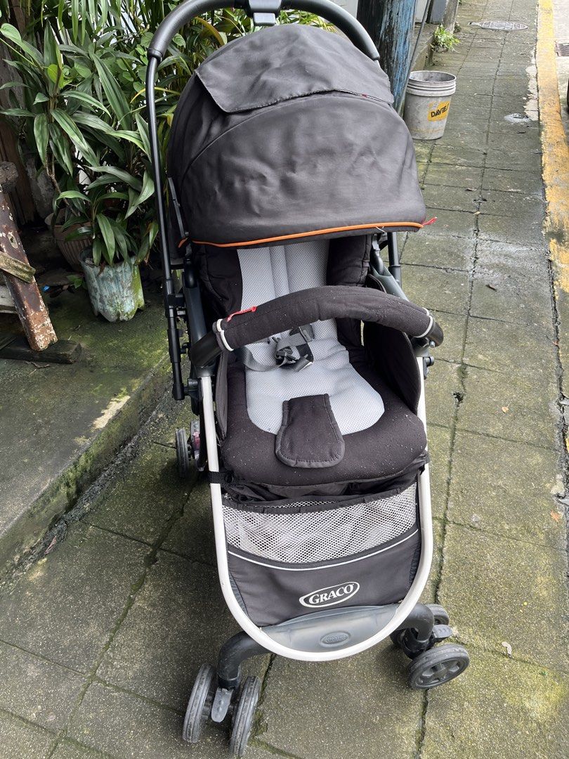 Graco Citi Ace Stroller Black Grey (Category: Strollers) located in Makati City. Submitted by aubssssss (Listing ID 1470408569, Image 2). Description: Brand: Graco - Color: Black and Grey - Compact fold design for easy travel and storage - Large storage basket underneath for essentials - Adjustable canopy with peek-a-boo flap - Comfortable padded seat insert included - 5-point harness for maximum security - Condition: Normal wear on frame and whe