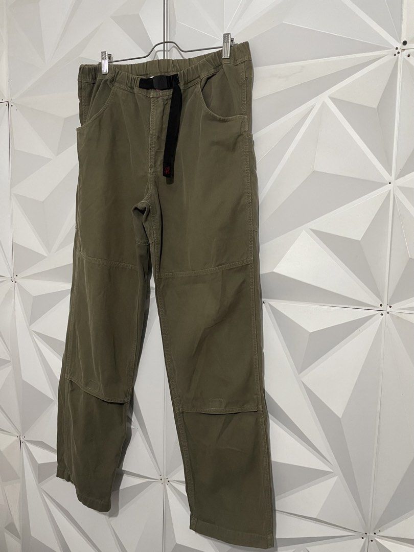 Gramicci Olive Green Canvas Double Knee Pants (Category: Trousers) located in Cabuyao City. Submitted by ParadisethriftedPh (Listing ID 1470547072, Image 2). Description: Cr:9/10 Dimensions W: 34-36 L: 41 - Brand: Gramicci - Color: Olive Green - Material: Sturdy canvas with reinforced knee panels - Fit: Relaxed straight leg - Waist: Elastic waistband with adjustable black webbed belt and buckle closure - Pockets: Deep front pockets and rear pocke