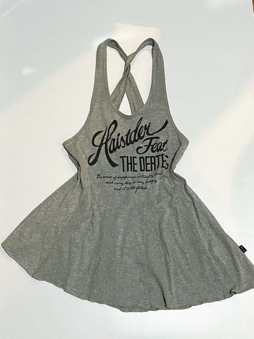 Gray crossback graphic flare tank top (Category: Sleeveless) located in Trece Martires City. Submitted by serenique_wear (Listing ID 1470426397, Image 2). Description: ⋆˚꩜｡⋆ med | collection s.o ⋆˚꩜｡⋆ likenew ⋆˚꩜｡⋆ the flare shape✨ ⋆˚꩜｡⋆ mine — ₱99.