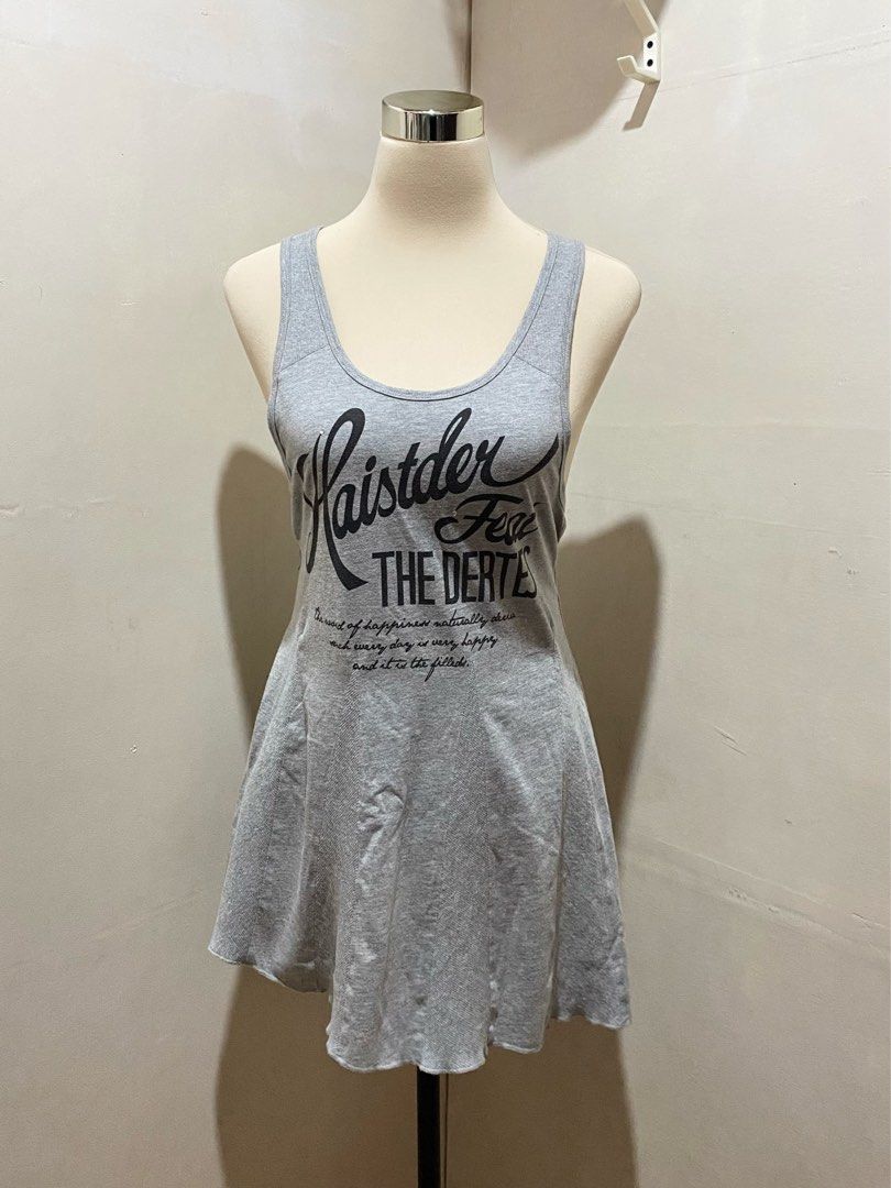 Gray crossback graphic flare tank top (Category: Sleeveless) located in Trece Martires City. Submitted by serenique_wear (Listing ID 1470426397, Image 1). Description: ⋆˚꩜｡⋆ med | collection s.o ⋆˚꩜｡⋆ likenew ⋆˚꩜｡⋆ the flare shape✨ ⋆˚꩜｡⋆ mine — ₱99.