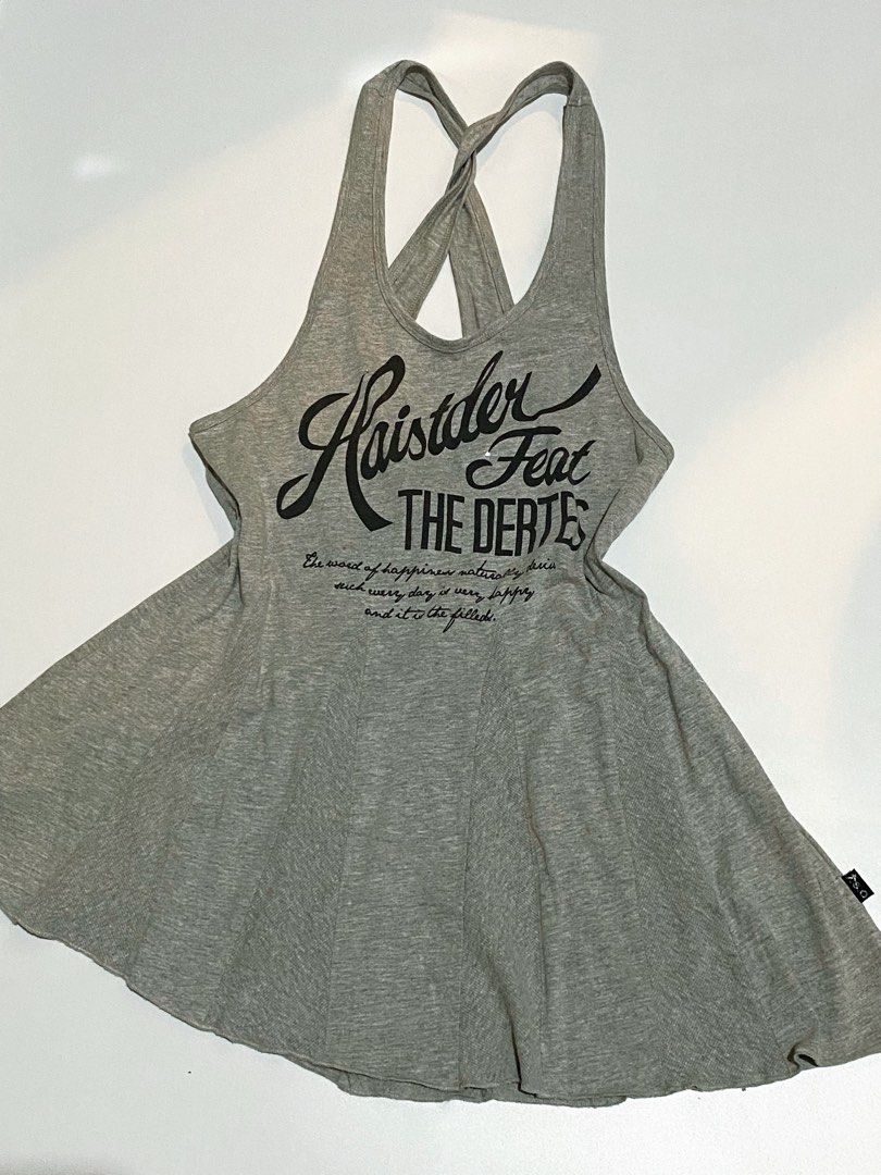 Gray crossback graphic flare tank top (Category: Sleeveless) located in Trece Martires City. Submitted by serenique_wear (Listing ID 1470426397, Image 3). Description: ⋆˚꩜｡⋆ med | collection s.o ⋆˚꩜｡⋆ likenew ⋆˚꩜｡⋆ the flare shape✨ ⋆˚꩜｡⋆ mine — ₱99.