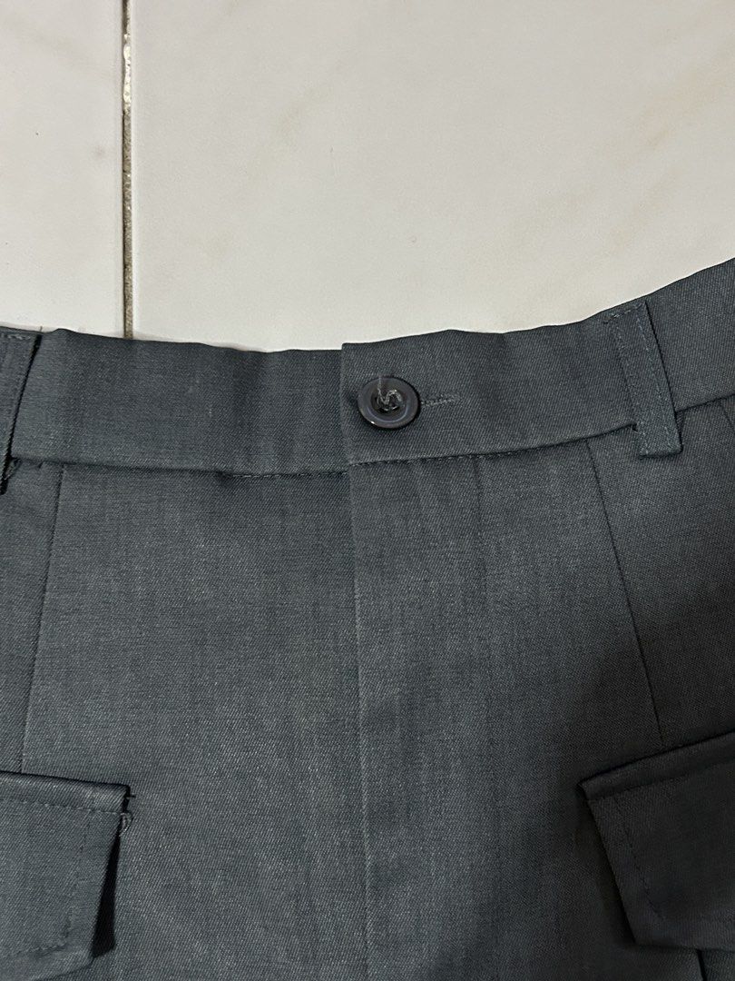 Gray Pleated Skirt (Category: Skirts) located in Manila. Submitted by viyyu (Listing ID 1470414935, Image 3). Description: •Pleated mini skirt •Structured front with belt loops and button closure, plus an elastic back for easy fit •fake pockets for design only .