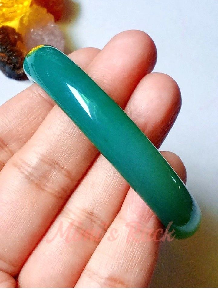 Green Agate Hard Bangle Bracelet (Category: Bracelets) located in Taguig. Submitted by mimisrack (Listing ID 1470377706, Image 3). Description: 💚💰 Wealth & Prosperity — symbolizes abundance, financial growth, and opportunities for success. 🍀 Good Luck & Fortune — traditionally associated with blessings and favorable beginnings. 🛡️ Protection & Grounding — represents stability, security, and resilience. 🌱 Growth & Renewal — green symbolizes f