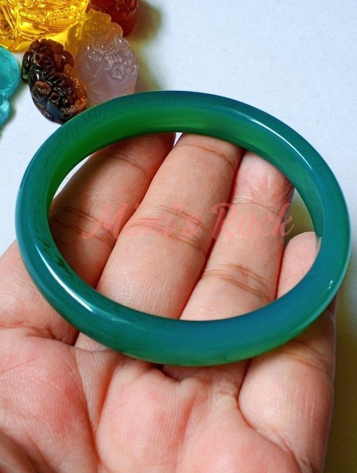 Green Agate Hard Bangle Bracelet (Category: Bracelets) located in Taguig. Submitted by mimisrack (Listing ID 1470377706, Image 2). Description: 💚💰 Wealth & Prosperity — symbolizes abundance, financial growth, and opportunities for success. 🍀 Good Luck & Fortune — traditionally associated with blessings and favorable beginnings. 🛡️ Protection & Grounding — represents stability, security, and resilience. 🌱 Growth & Renewal — green symbolizes f