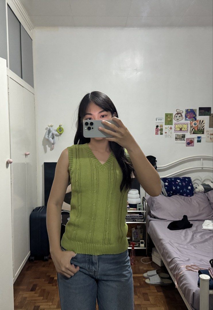 Green Cable Knit V-Neck Sweater Vest (Category: Sleeveless) located in Angeles City. Submitted by m1lkramen (Listing ID 1470466556, Image 1). Description: - Color: Green - Design: Vertical cable knit pattern throughout - Style: V-neckline, sleeveless, ribbed hem and arm openings - Material: Soft, comfortable knit fabric - Versatility: Perfect for layering over button-downs or wearing on its own - Condition: Excellent / Ready to wear · · ─ ·✶· ─ ·