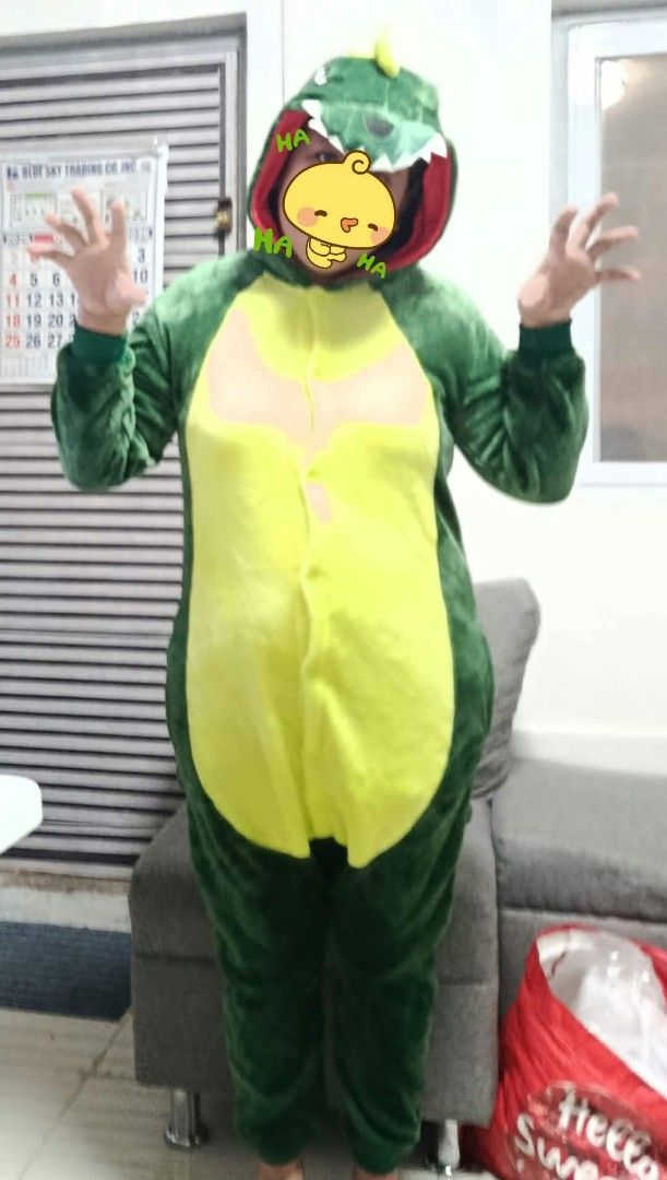 Green Dinosaur Costume (Category: Everything Else Others) located in Quezon City. Submitted by robelles_thriftshop (Listing ID 1470458379, Image 1). Description: - Material: Ultra-soft plush fleece for maximum warmth and comfort - Design: Full-body green jumpsuit with a yellow belly panel and fun spikes alon the back and tail - Features: Hood with a cute dinosaur face and felt teeth, plus a convenient front button closure - Versatile: Great for l