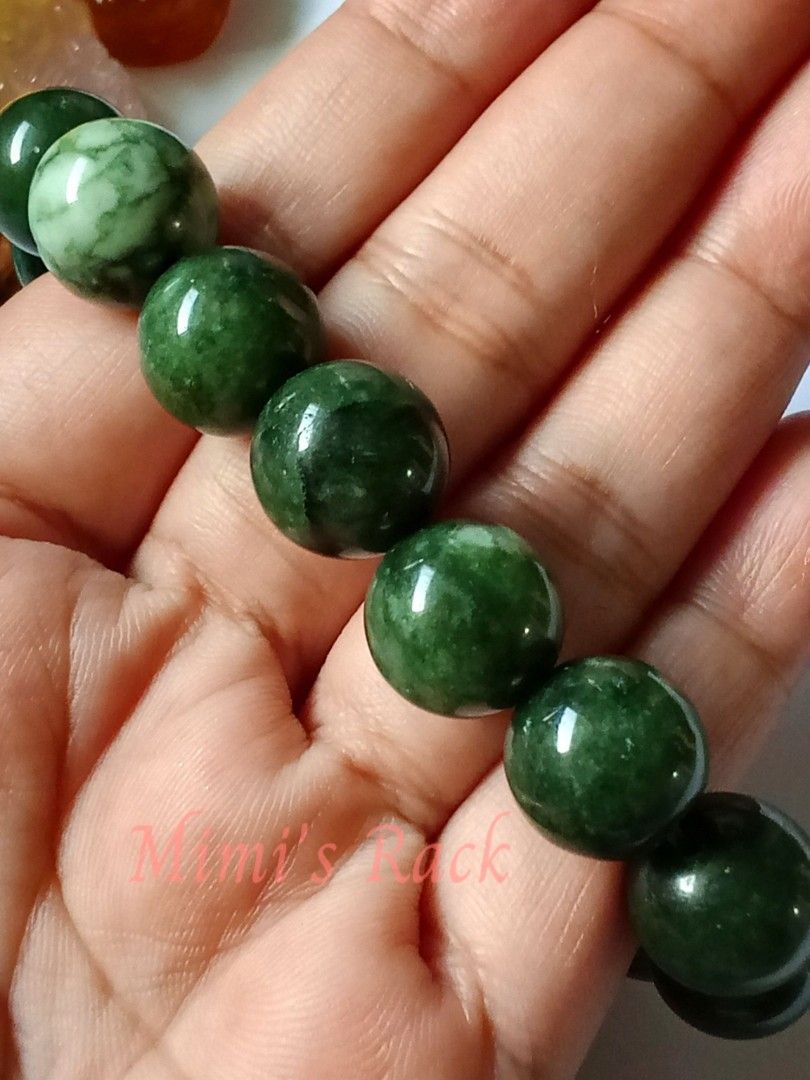 Green Jade Round Beads Bracelet 13mm (Category: Bracelets) located in Taguig. Submitted by mimisrack (Listing ID 1470532166, Image 2). Description: 💚🍀 Good Luck & Fortune — jade is cherished in Chinese culture as a symbol of blessings and auspicious opportunities. 💰 Wealth & Prosperity — green represents abundance, financial growth, and business success. 🛡️ Protection & Safety — traditionally worn as a protective talisman for security and wel