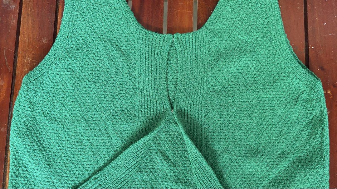 Green Knit Vest Open Front Tank Top (Category: Sleeveless) located in Batangas. Submitted by rm0401 (Listing ID 1470349560, Image 2). Description: - Color: Bright green - Style: Sleeveless knit vest with scoop neckline - Design: All-over textured pattern with ribbed hem - Closure: Small clasp at center front - Fit & Fabric: Soft, comfortable knit; great casual layering piece FITS TO: SMALL-MEDIUM.