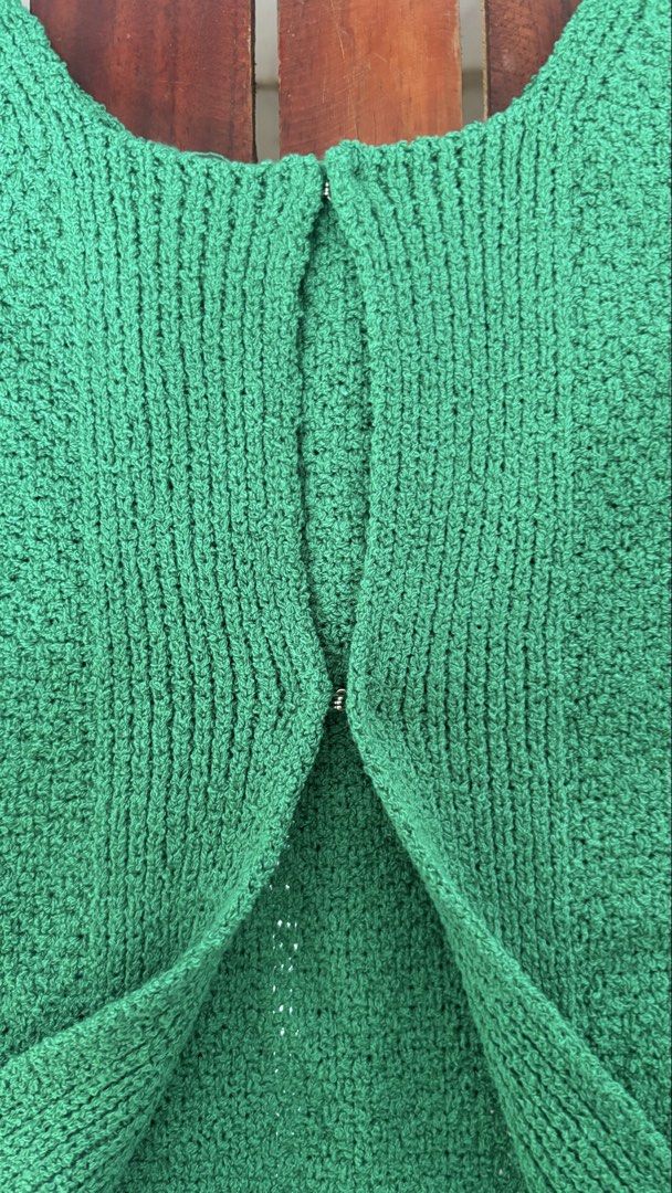 Green Knit Vest Open Front Tank Top (Category: Sleeveless) located in Batangas. Submitted by rm0401 (Listing ID 1470349560, Image 3). Description: - Color: Bright green - Style: Sleeveless knit vest with scoop neckline - Design: All-over textured pattern with ribbed hem - Closure: Small clasp at center front - Fit & Fabric: Soft, comfortable knit; great casual layering piece FITS TO: SMALL-MEDIUM.