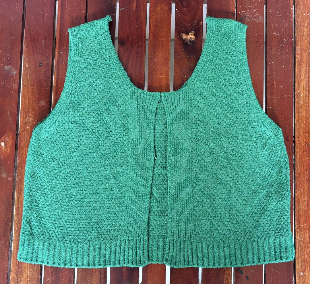 Green Knit Vest Open Front Tank Top (Category: Sleeveless) located in Batangas. Submitted by rm0401 (Listing ID 1470349560, Image 1). Description: - Color: Bright green - Style: Sleeveless knit vest with scoop neckline - Design: All-over textured pattern with ribbed hem - Closure: Small clasp at center front - Fit & Fabric: Soft, comfortable knit; great casual layering piece FITS TO: SMALL-MEDIUM.