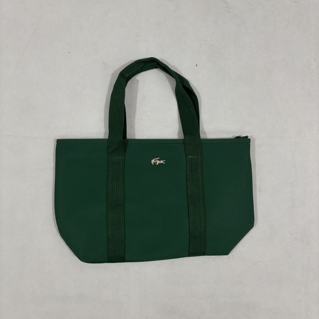 Green Lacoste Tote Bag (Category: Tote Bags) located in Cavite. Submitted by itsayaaa (Listing ID 1470541406, Image 3). Description: No issue Excellent Condition .