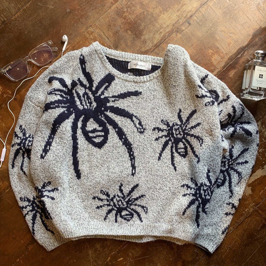 Grey Spider Graphic Knit Sweater Oversized (Category: Longsleeves) located in Manila. Submitted by shardz07 (Listing ID 1470409313, Image 1). Description: - Brand: Elfasion - Design: Oversized spider graphics all over - Color: Grey and black - Fit: Loose and relaxed - Features: Crew neck, thick cozy material, ribbed collar, cuffs, and hem.