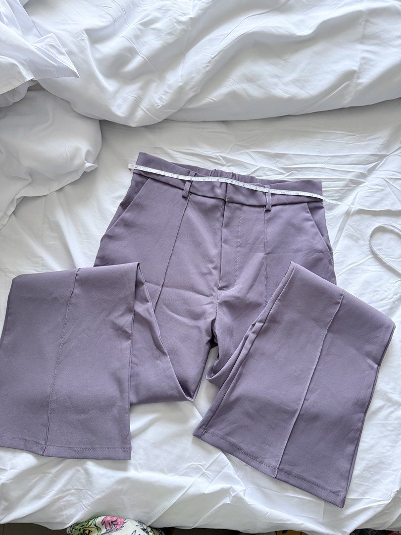 GRL Purple Slit Hem Trousers Size L (Category: Jeans) located in Mandaluyong City. Submitted by chi11ng (Listing ID 1470483087, Image 1). Description: - Brand: GRL - Size: L (Tag: Waist 66-71cm, Hip 89-95cm, Height 160-166cm) - Color: Purple - Material: 95% Polyester, 5% Polyurethane - Waist: ~13.5 inches across flat with back elastic & belt loops - Design: Front crease on each leg with trendy split cuffs - Pockets: Two back pockets - Condition: 