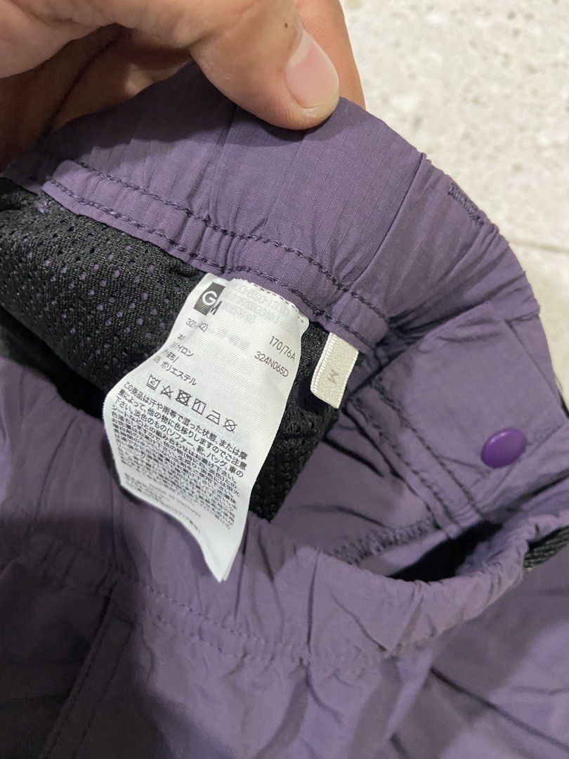 GU Utility Short (Category: Shorts) located in Calumpit. Submitted by Ketchi (Listing ID 1470498765, Image 2). Description: - Brand: GU - Color: Purple - Size: Medium (M) - Material: Lightweight, water-repellent nylon with mesh inner lining - Features: Built-in black web belt on elastic waistband and large zipper cargo pockets on both sides - Style: Ideal for streetwear and outdoor activities.
