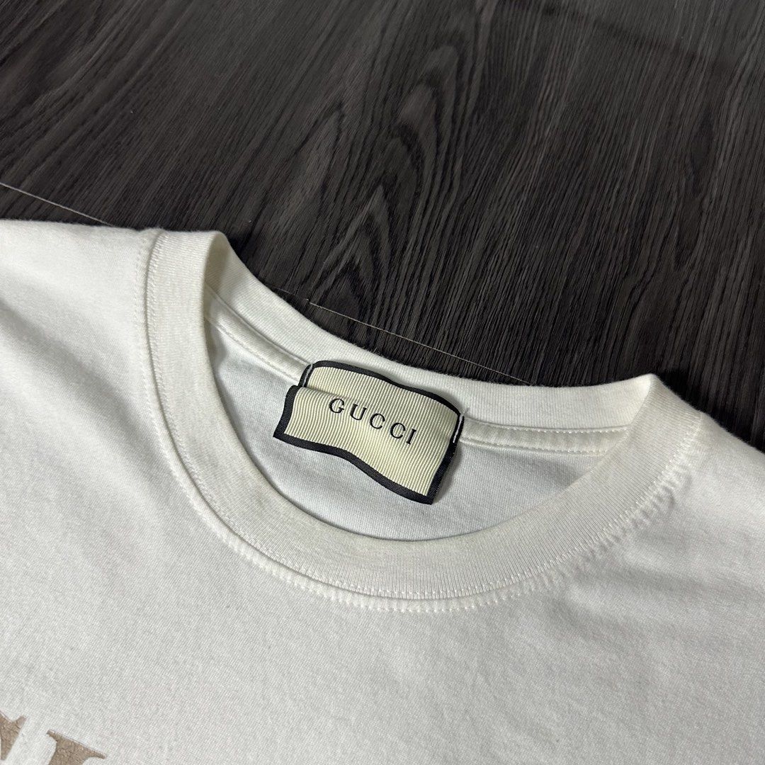 GUCCI (Category: Formal Shirts) located in San Jose del Monte. Submitted by xanthrift2.0 (Listing ID 1470456129, Image 3). Description: GUCCI WHITE TEE color rate: 9.8/10 dimes: 22 x 27 (medium) ₱799.